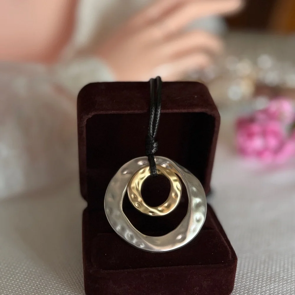 Black Cord Necklace with Silver and Gold Pendant